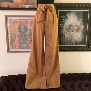 Wide Leg. High waisted. Tie front pants from Nasty Gal.